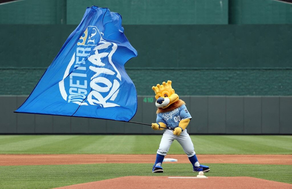 The Kansas City Royals mascot Sluggerrr waves a flag prior to a game at at Kauffman Stadium in Kansas City, Missouri.